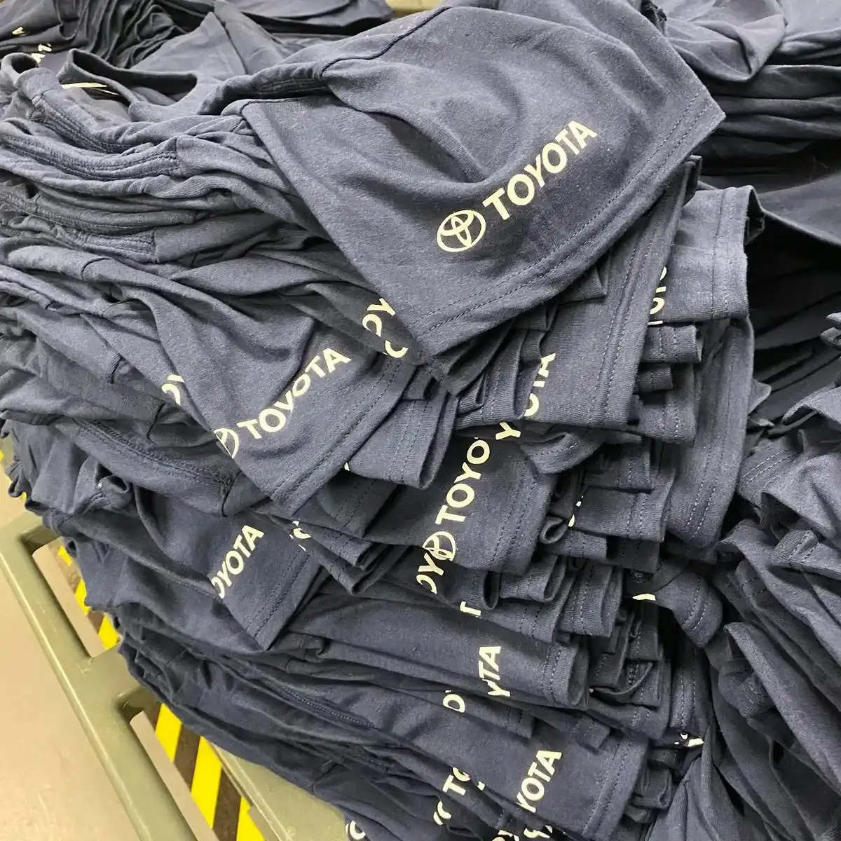 Bulk workwear t-shirt order with company logos — workwear printing Romford