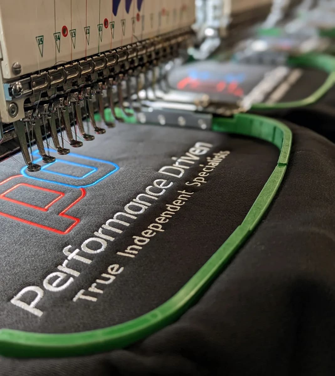 Custom embroidered workwear sample with company logo — embroidery services Romford